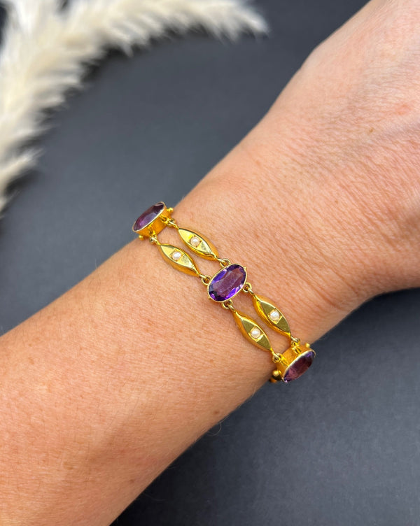Antique Art Nouveau 15 Carat Yellow Gold Amethyst and Seed Pearl Two Row Bracelet