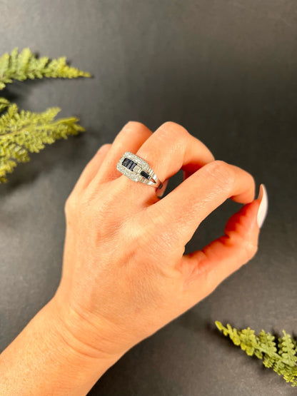 A sapphire and diamond cocktail ring in platinum, modelled on a hand