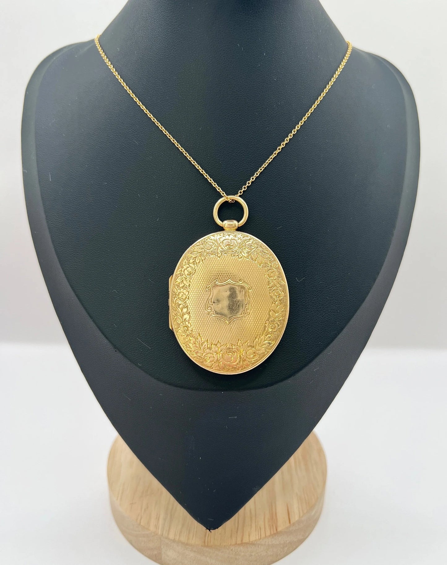 Victorian 15 Carat Yellow Gold Large Floral Engraved Oval Locket, Circa 1880