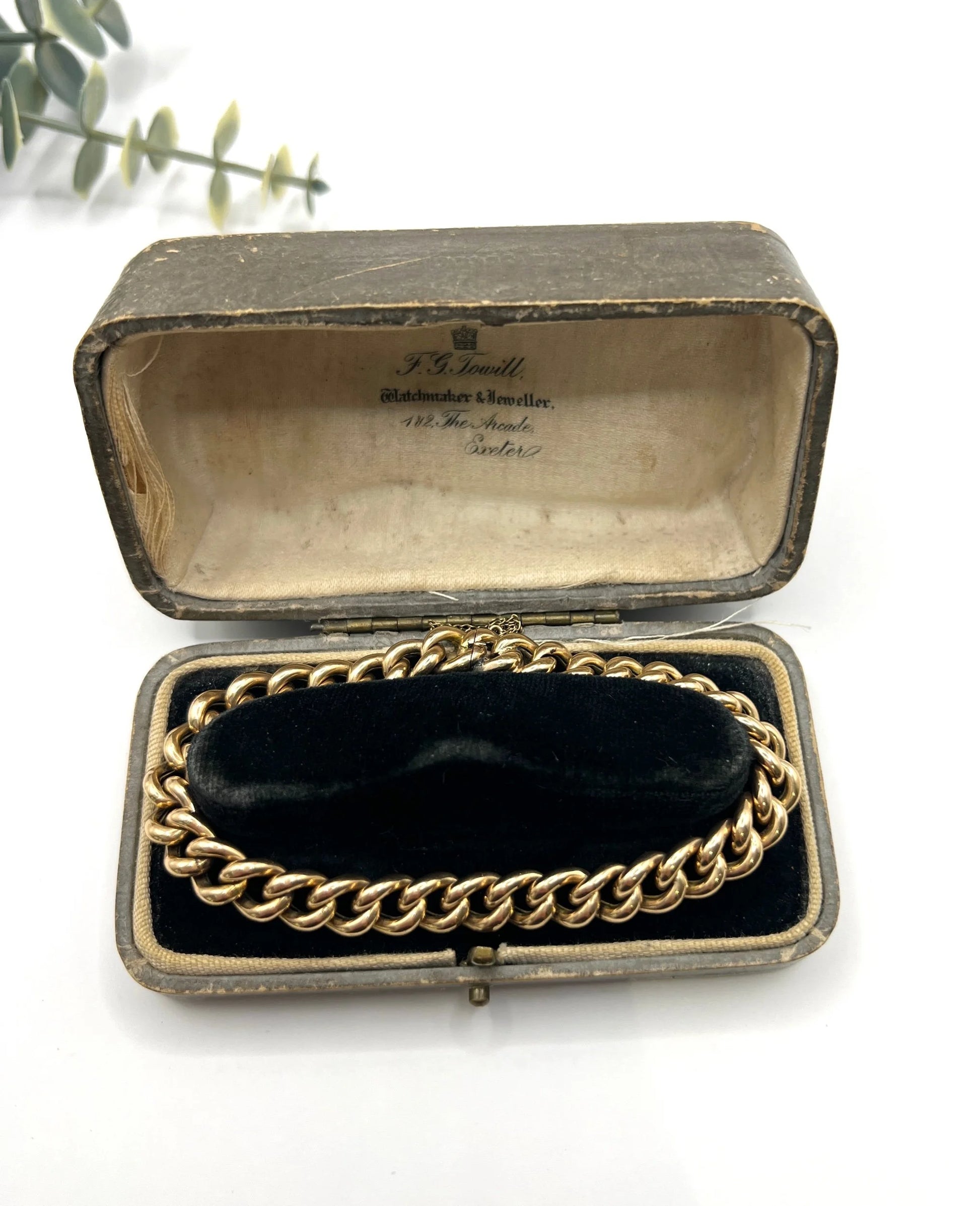 A curb link bracelet in yellow gold, in an antique box