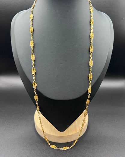 A yellow gold fancy link chain necklace