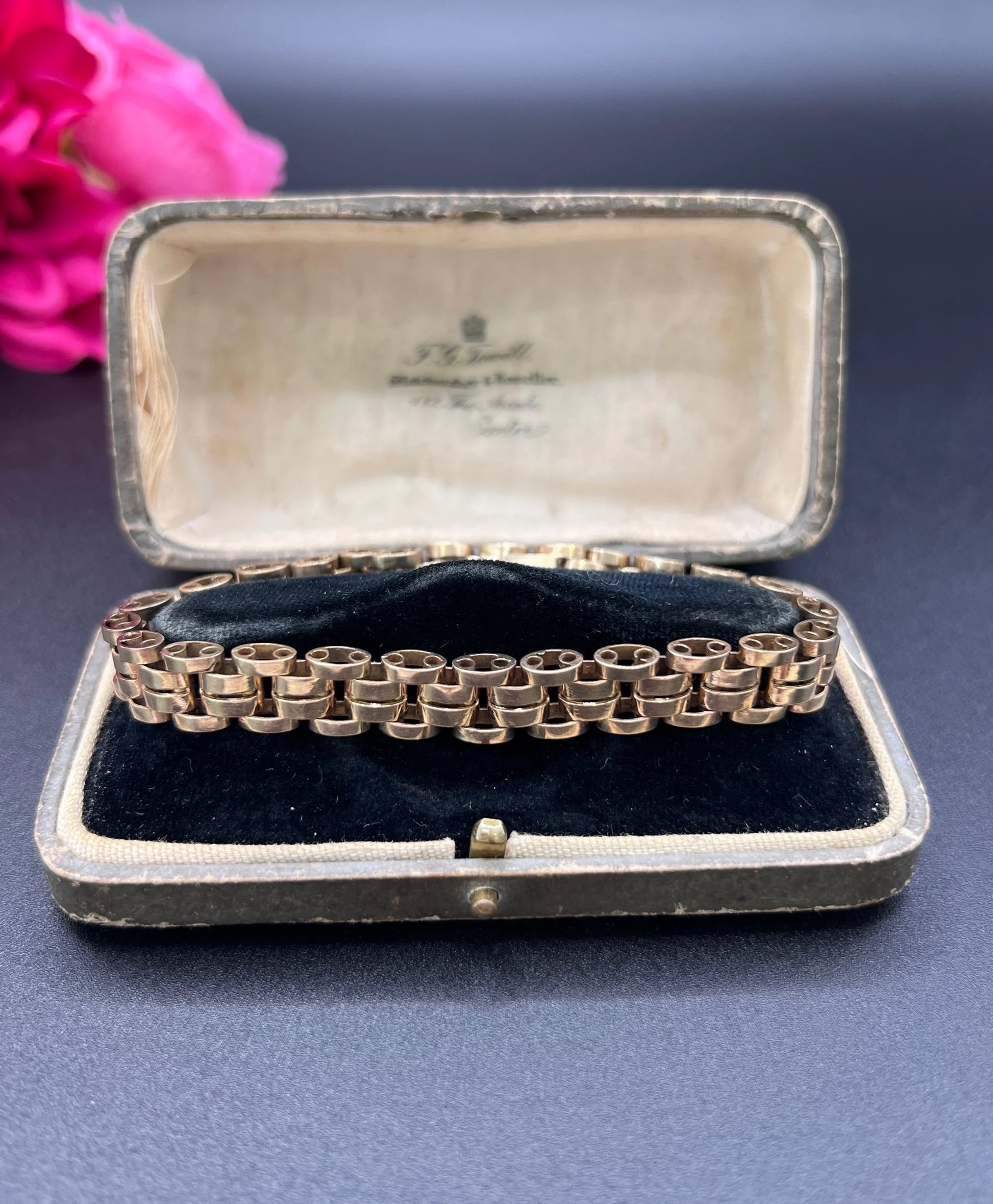 A yellow gold link bracelet, in an antique box