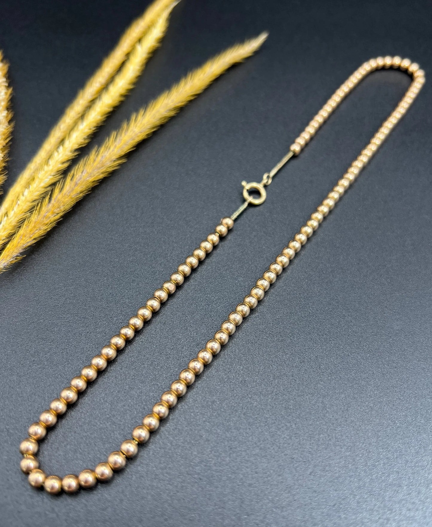 Edwardian 9 Carat Rose Gold Marseille Gold Ball Necklace, Circa 1910