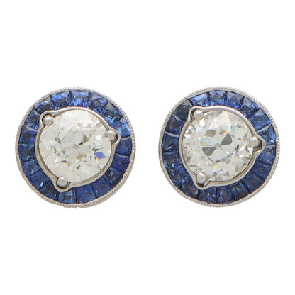 Diamond and sapphire target earrings set in platinum.