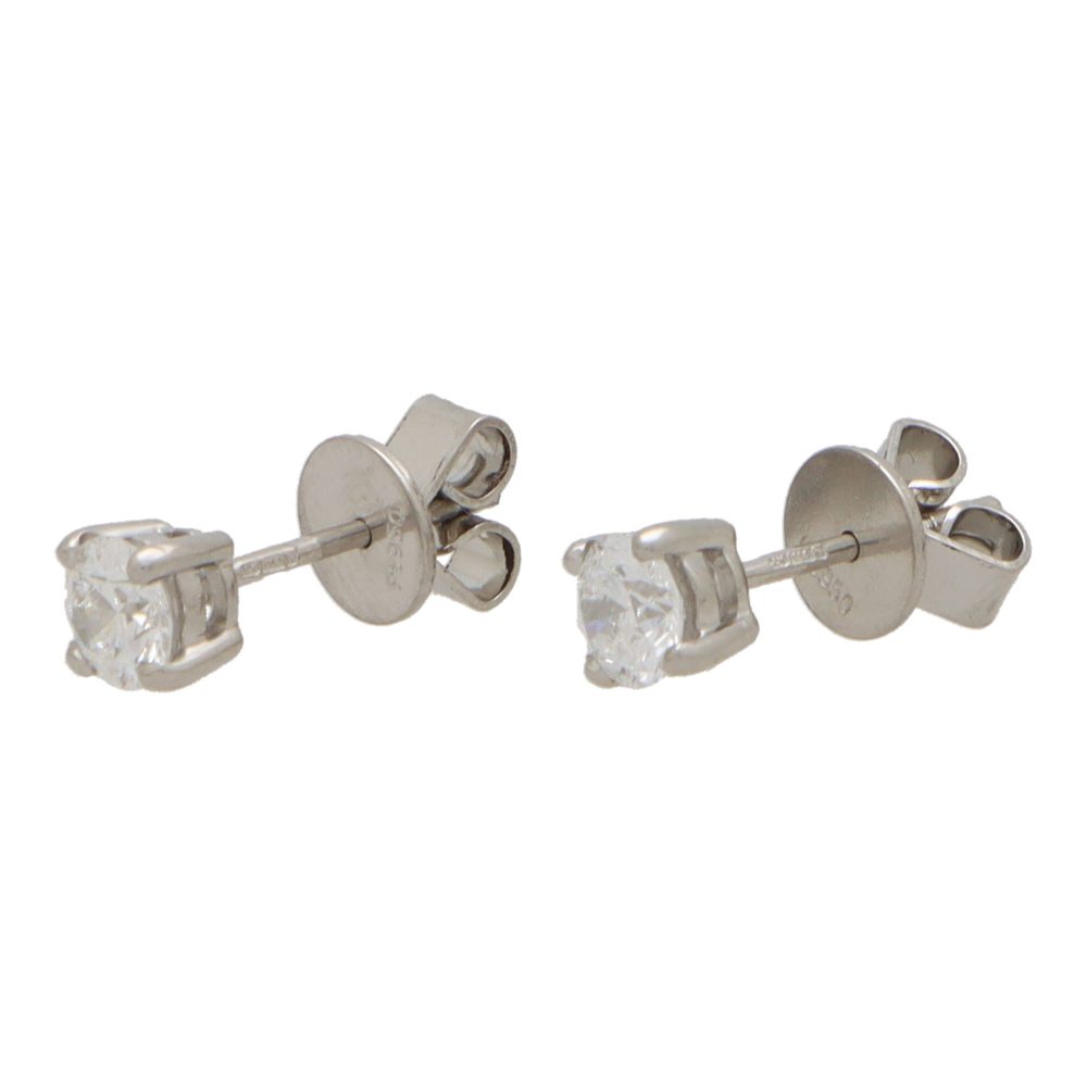 GIA certified diamond stud earrings in platinum.