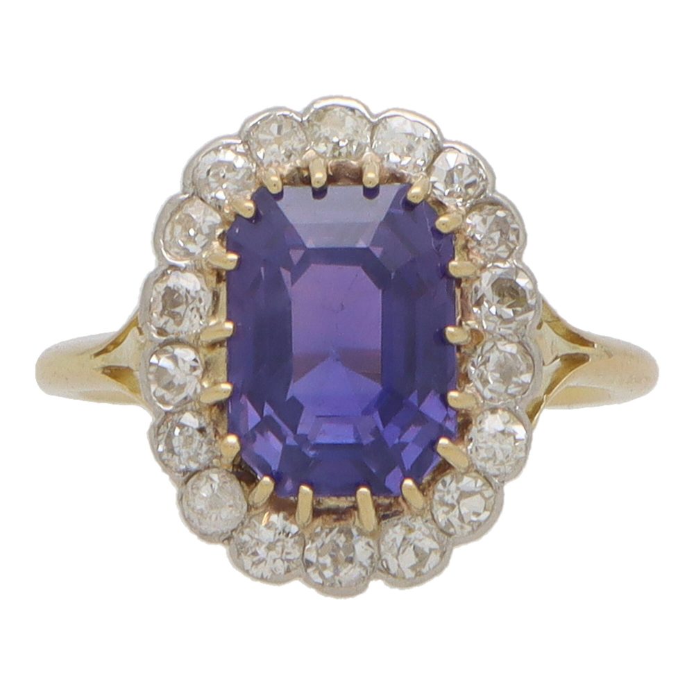 Vintage colour change sapphire and diamond cluster ring in yellow and white gold.