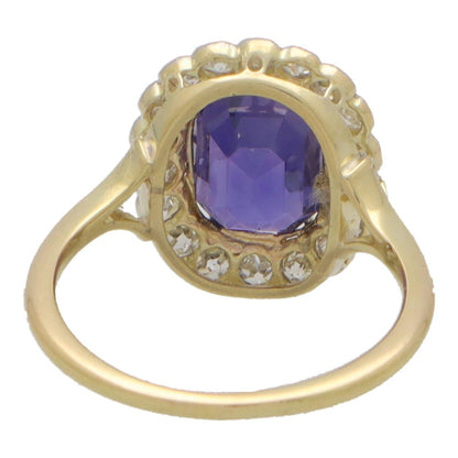 Vintage colour change sapphire and diamond cluster ring in yellow and white gold.