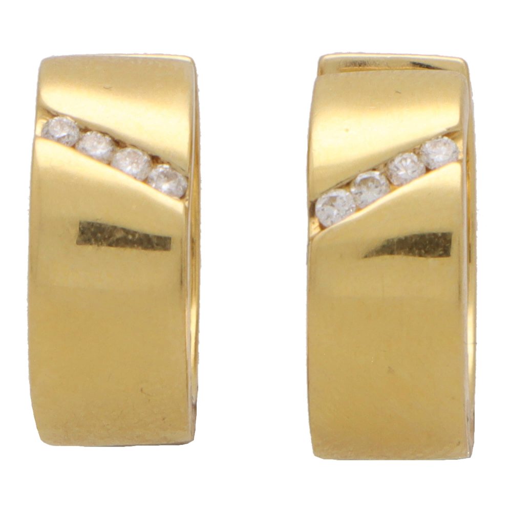 Vintage diamond hoop earrings in yellow gold.