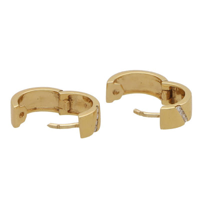 Vintage diamond hoop earrings in yellow gold.