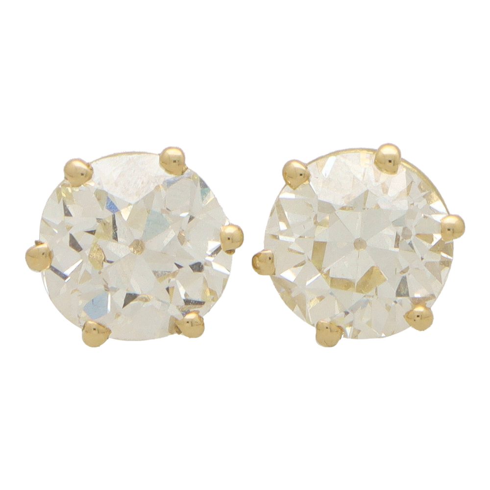 Old European cut diamond stud earrings set in gold.