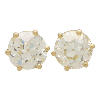Old European cut diamond stud earrings set in gold.