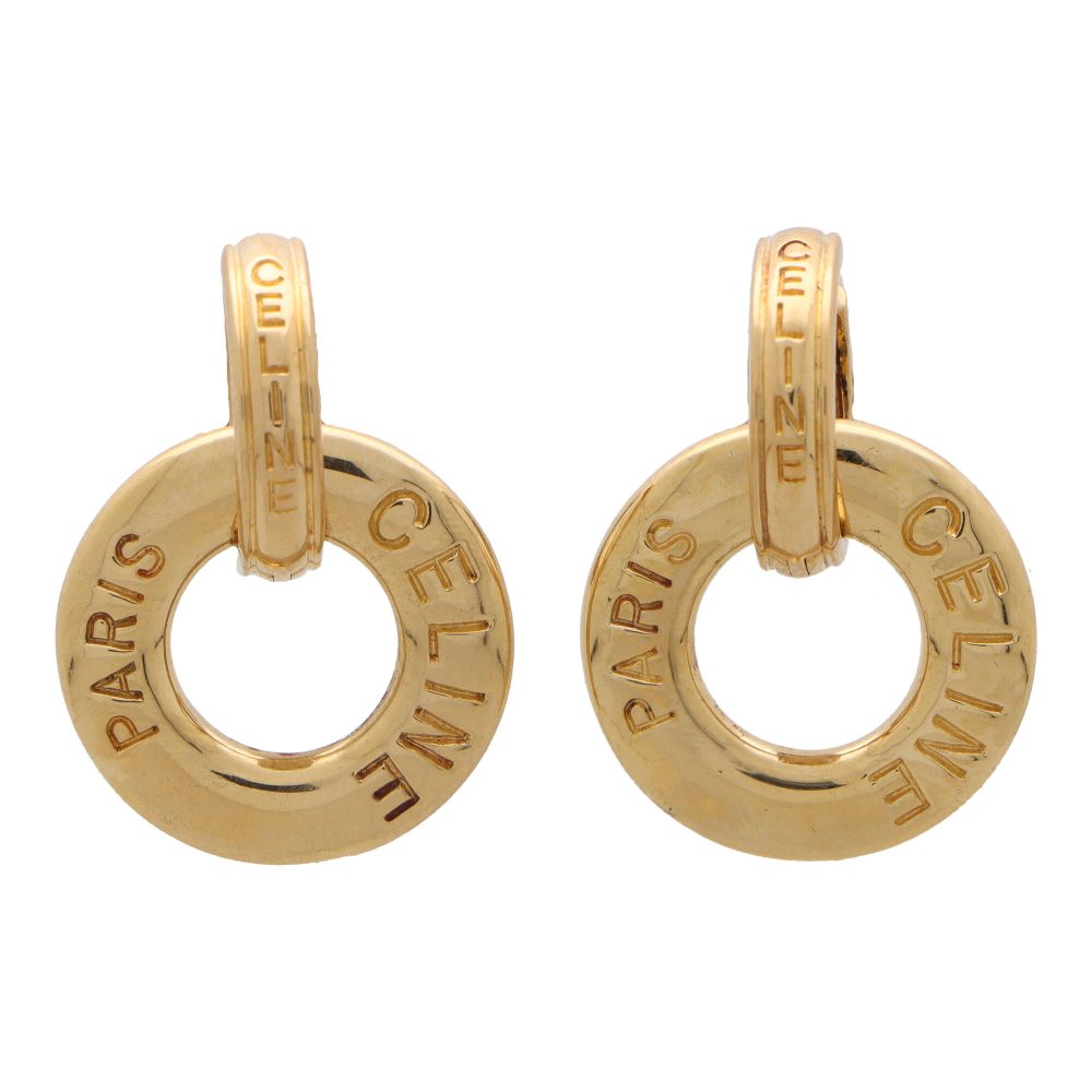 Celine logo detachable hoop earrings in yellow gold.