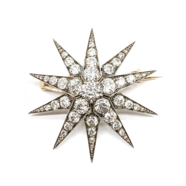 FRENCH ANTIQUE DIAMOND SILVER AND GOLD STAR BROOCH