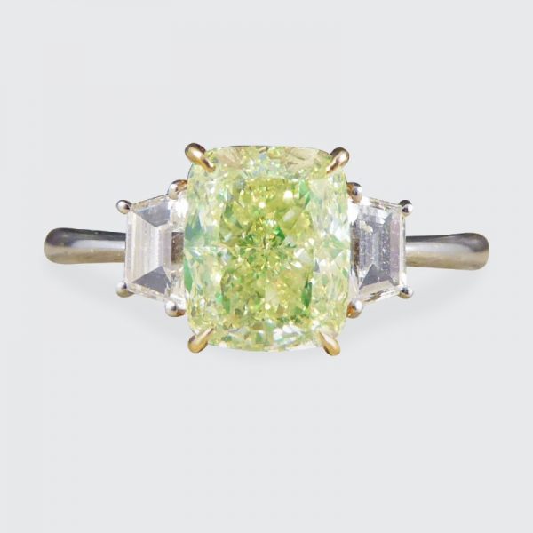 Fancy Light Green 2.40ct Diamond and White Diamond Three Stone Ring