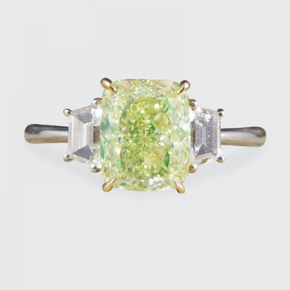 Fancy Light Green 2.40ct Diamond and White Diamond Three Stone Ring