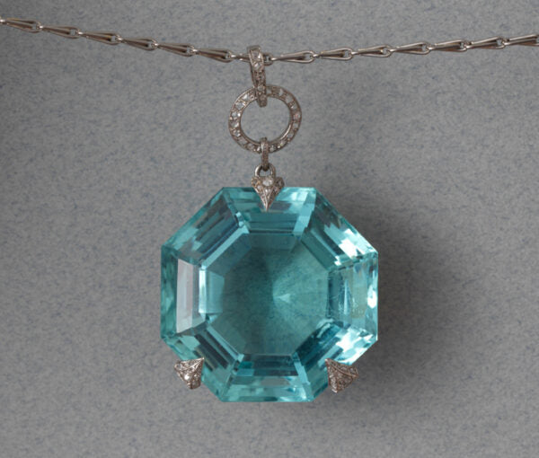 Georges Fouquet Art Deco 80ct Octagonal Aquamarine Pendant; in three rose-cut diamond-set platinum prongs, Signed by Master mark of Fouquet, Circa 1920.