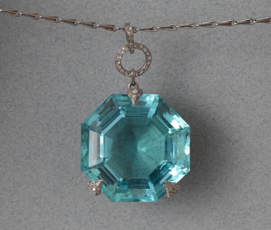 Georges Fouquet Art Deco 80ct Octagonal Aquamarine Pendant; in three rose-cut diamond-set platinum prongs, Signed by Master mark of Fouquet, Circa 1920.