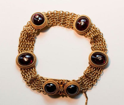 Antique Georgian Neo Etruscan Garnet, Diamond and 18ct Gold Bracelet; finely woven 18ct gold bracelet set with six large cabochon cut garnets