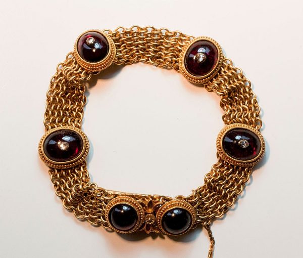Antique Georgian Neo Etruscan Garnet, Diamond and 18ct Gold Bracelet; finely woven 18ct gold bracelet set with six large cabochon cut garnets