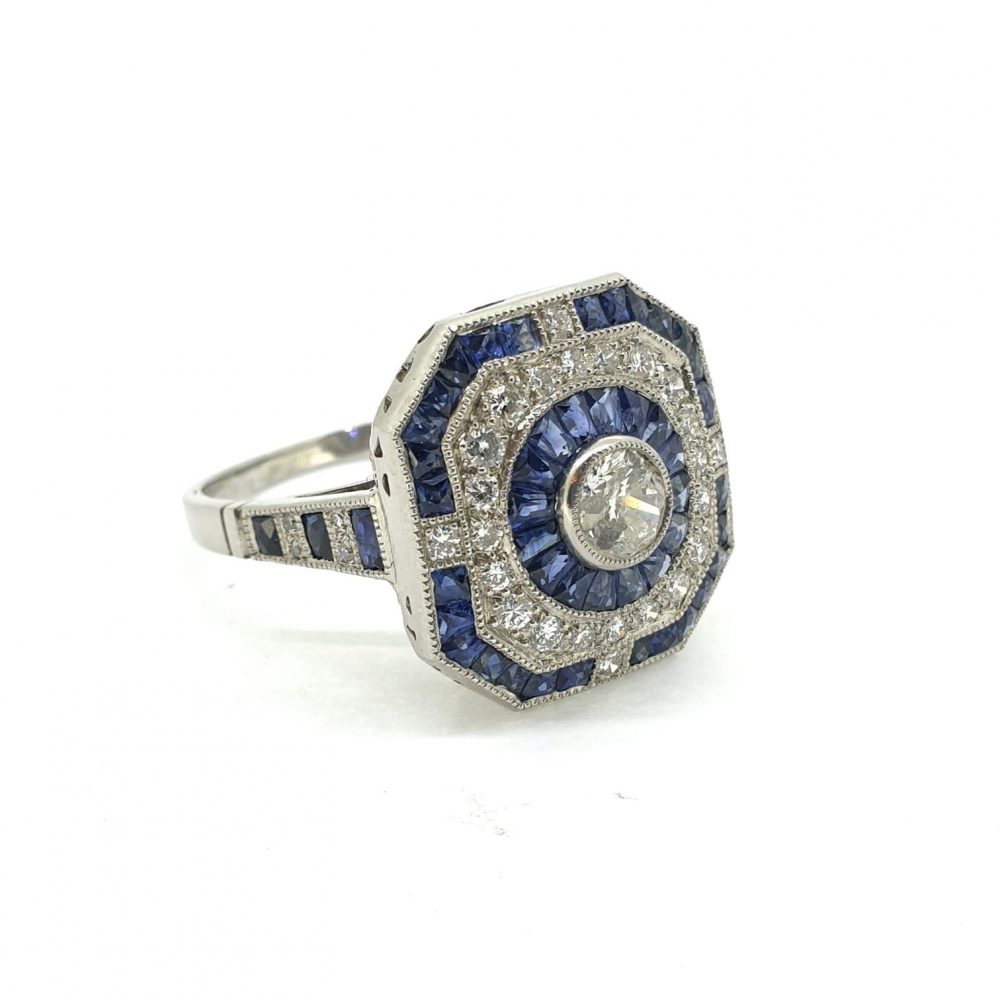 Diamond and Calibre Sapphire Target Cluster Dress Ring in Platinum