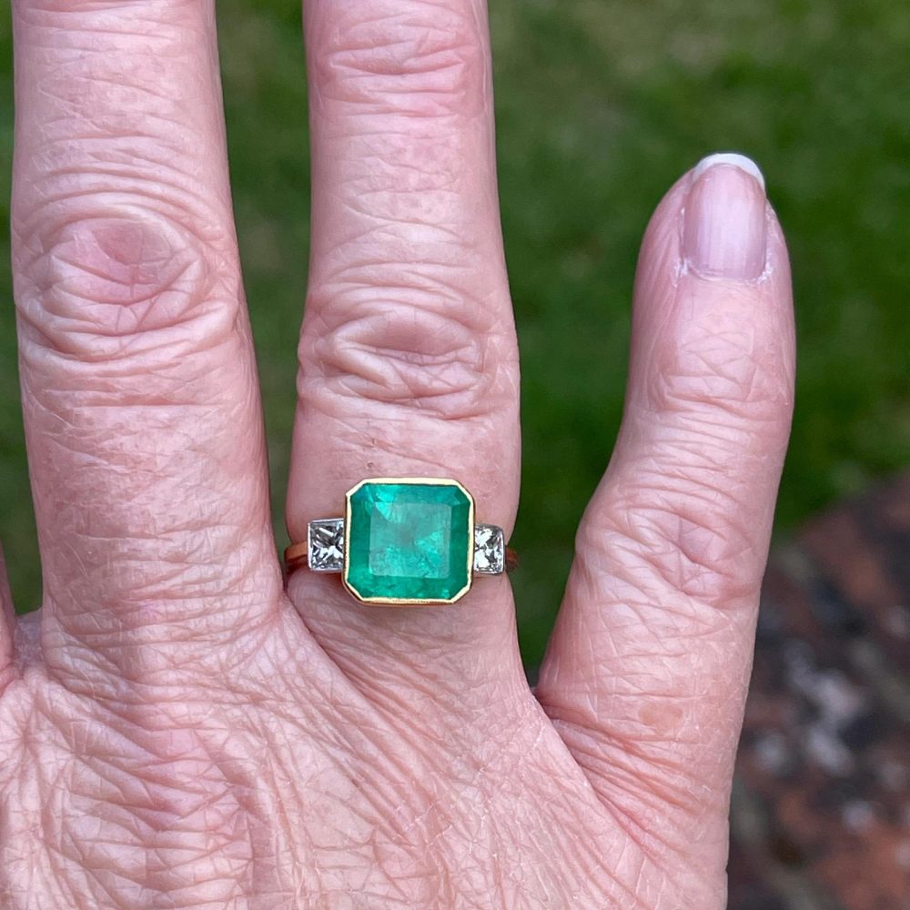 5ct Octagonal Cut Emerald and Diamond Three Stone Ring in 18ct Yellow Gold