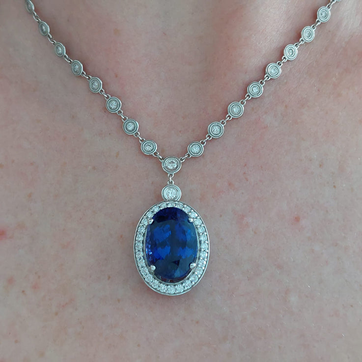 Fine 18.41ct Oval Tanzanite and Diamond Cluster Pendant Necklace on Diamond Set Chain