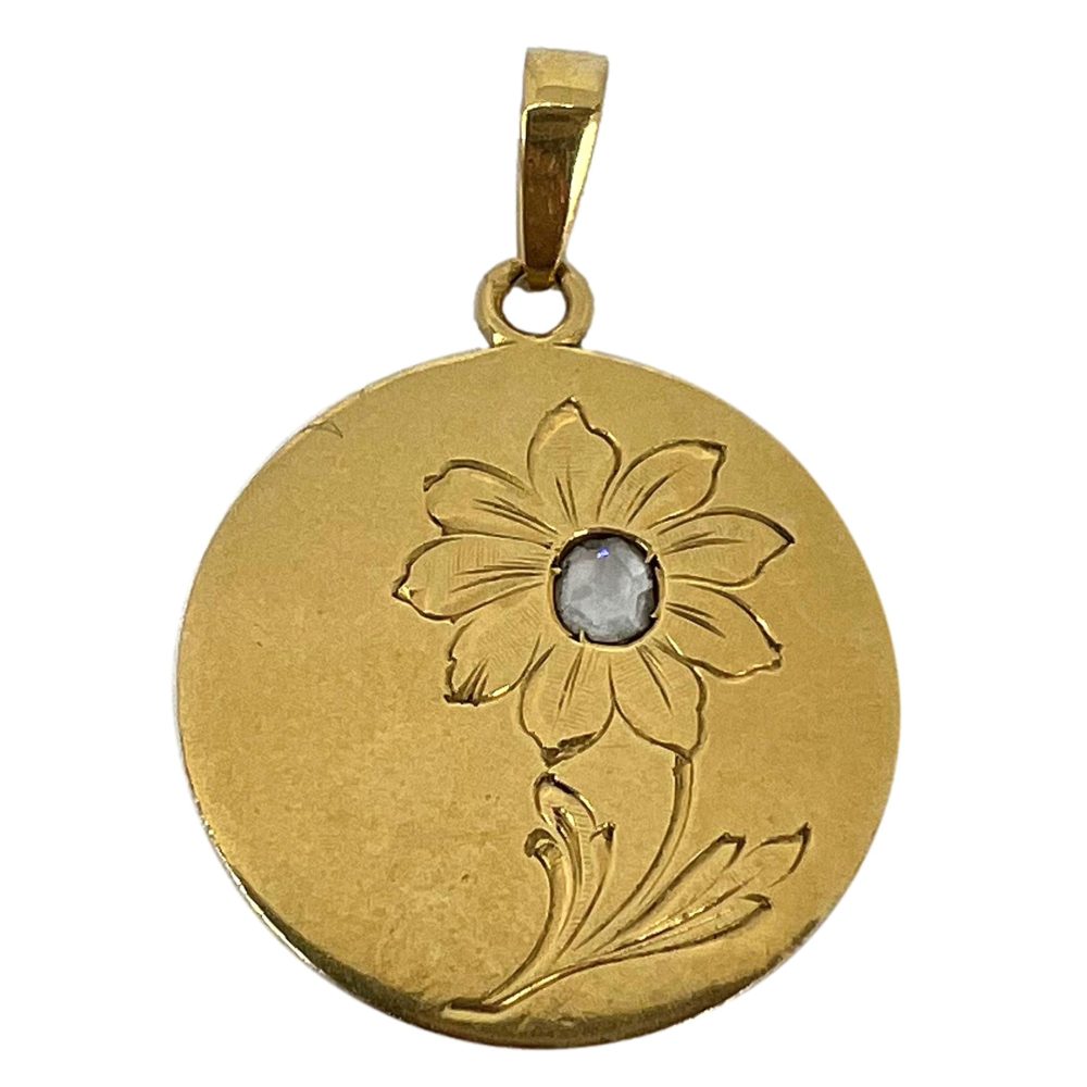 French Daisy flower charm pendant in gold set with a diamond.