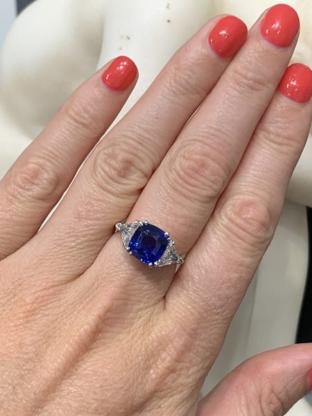 Sapphire engagement ring 4 carats cushion no heat triangular cut diamond shoulders