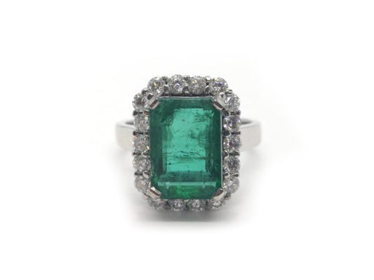 Emerald Cut Emerald and Diamond Cluster Ring in 18ct White Gold