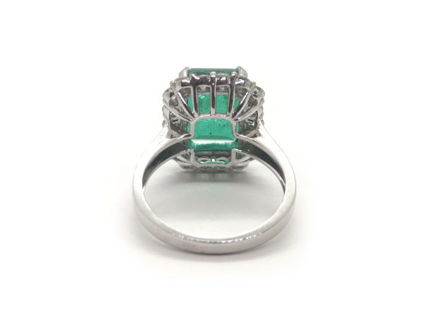 Emerald Cut Emerald and Diamond Cluster Ring in 18ct White Gold