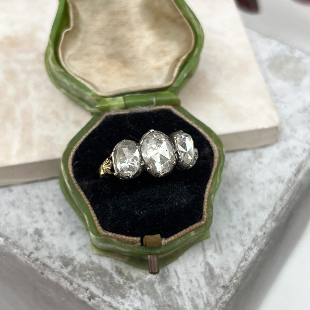Antique 19th century three stone diamond ring in 18ct yellow gold and silver with rose-cut diamonds