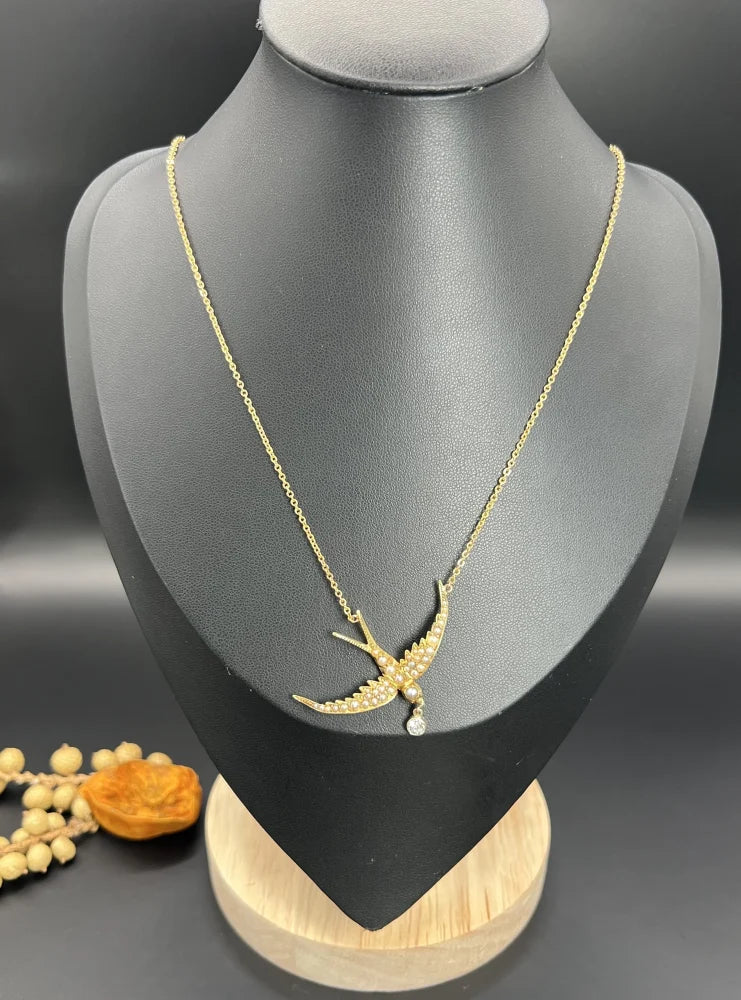 Antique 15 Carat Yellow Gold Swallow Pendant Necklace With Pearls And Diamond Drop