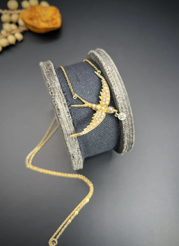 Antique 15 Carat Yellow Gold Swallow Pendant Necklace With Pearls And Diamond Drop