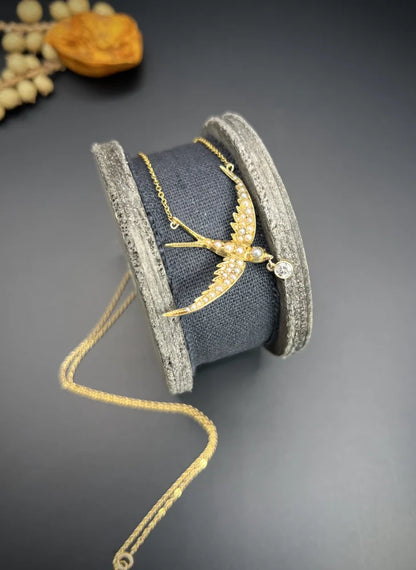 Antique 15 Carat Yellow Gold Swallow Pendant Necklace With Pearls And Diamond Drop