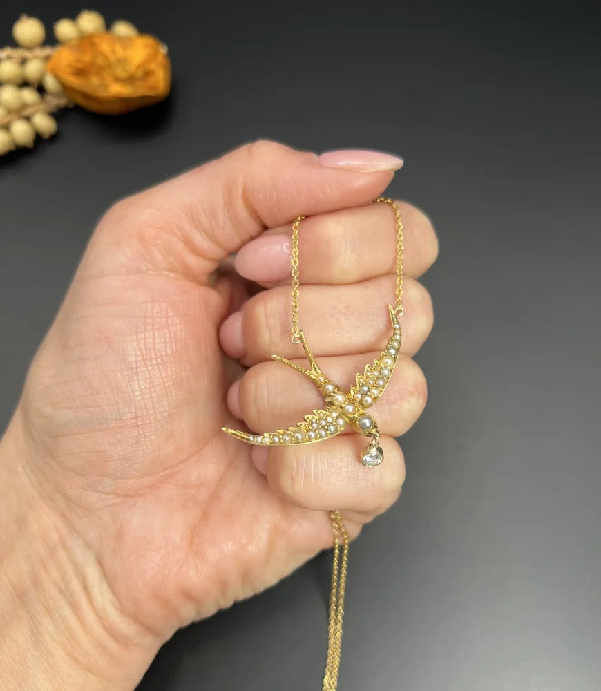 Antique 15 Carat Yellow Gold Swallow Pendant Necklace With Pearls And Diamond Drop