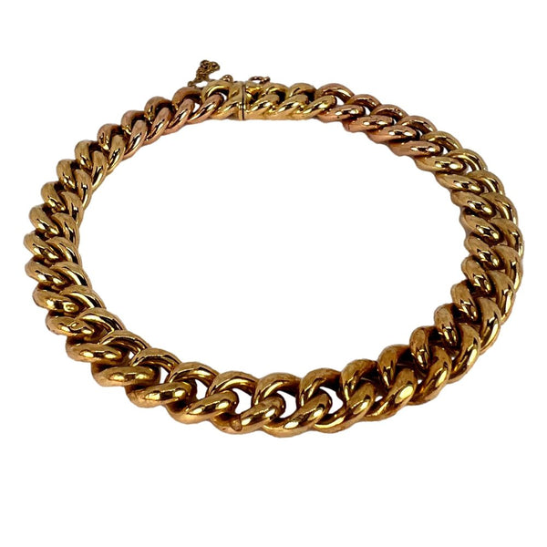 Curb link bracelet in yellow and rose gold.