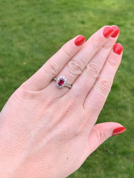 Ruby and diamond cluster engagement ring