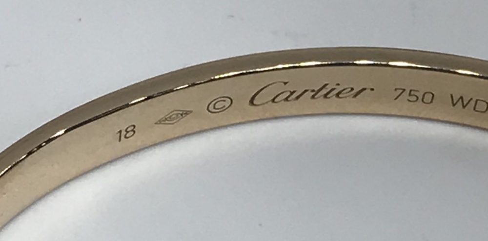 Pink gold cartier love bangle bracelet London UK