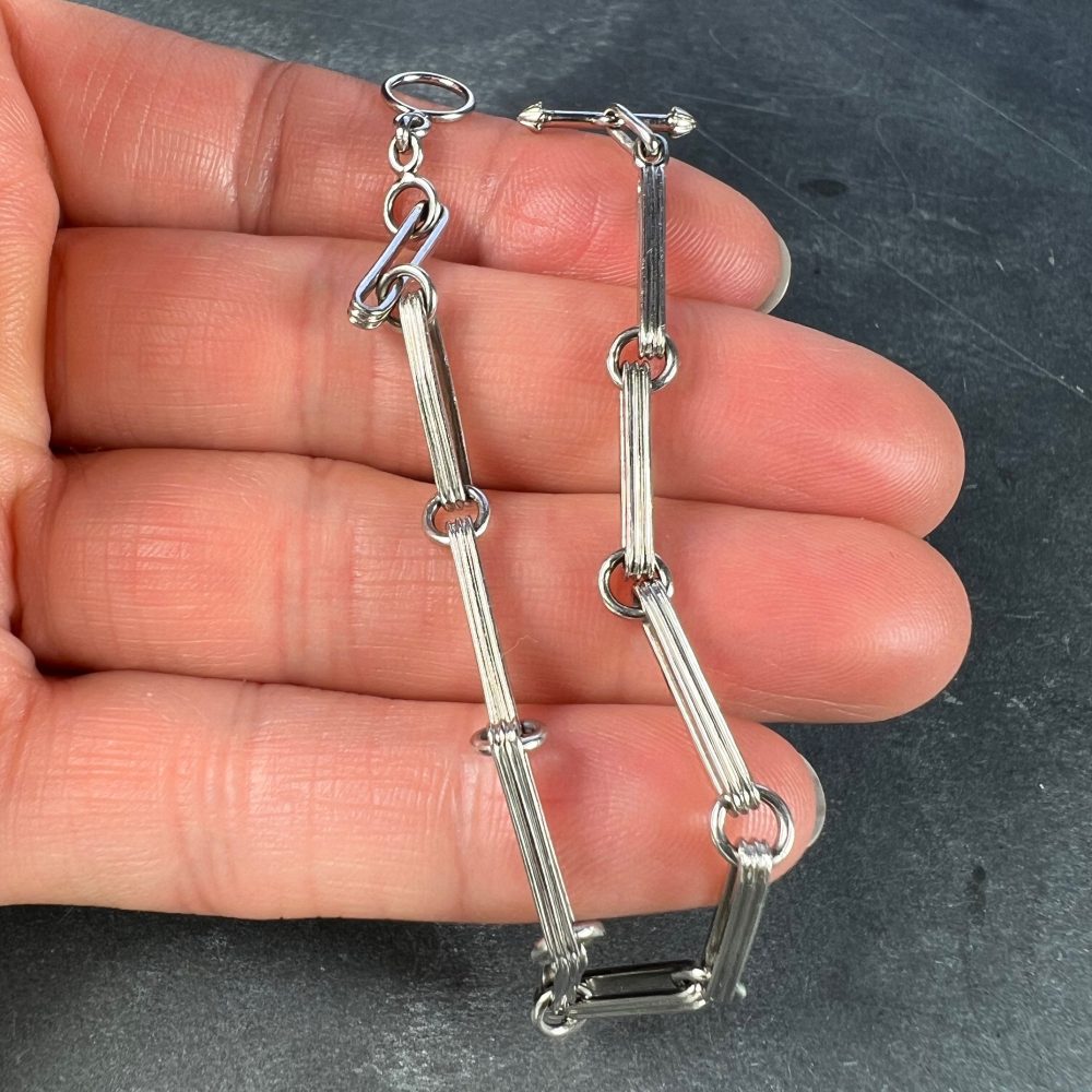 Art Deco Platinum Fancy Link Chain Bracelet with ridged elongated links connected by circular rings