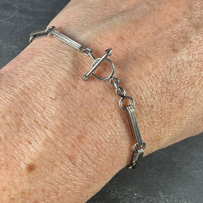 Art Deco Platinum Fancy Link Chain Bracelet with ridged elongated links connected by circular rings