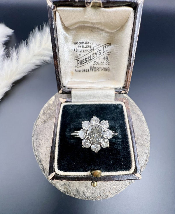 Vintage 1.50ct Diamond Daisy Cluster Engagement Ring in Platinum, 1.50 carats of sparkling diamonds arranged in timeless floral design in platinum