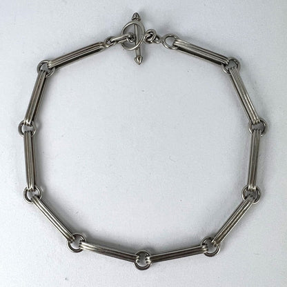 Art Deco Platinum Fancy Link Chain Bracelet with ridged elongated links connected by circular rings