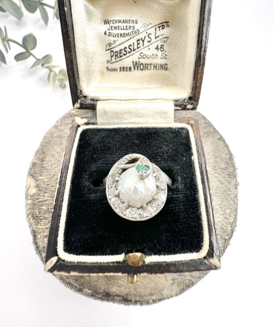Edwardian Antique Pearl Emerald Diamond Snake Ring in Platinum, diamond-set snake coiled around pearl with emerald eyes in platinum, Circa 1910