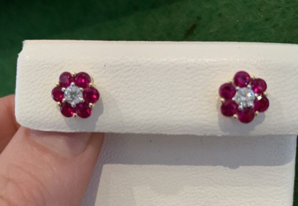 Ruby and diamond flower head cluster earrings yellow gold