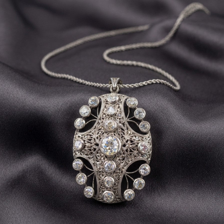 Edwardian Antique 8ct Old Mine Cut Diamond Pendant come Brooch in Platinum