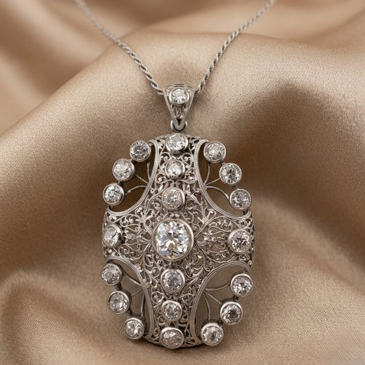 Edwardian Antique 8ct Old Mine Cut Diamond Pendant come Brooch in Platinum