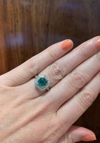 Deco style emerald and diamond engagement ring square target platinum