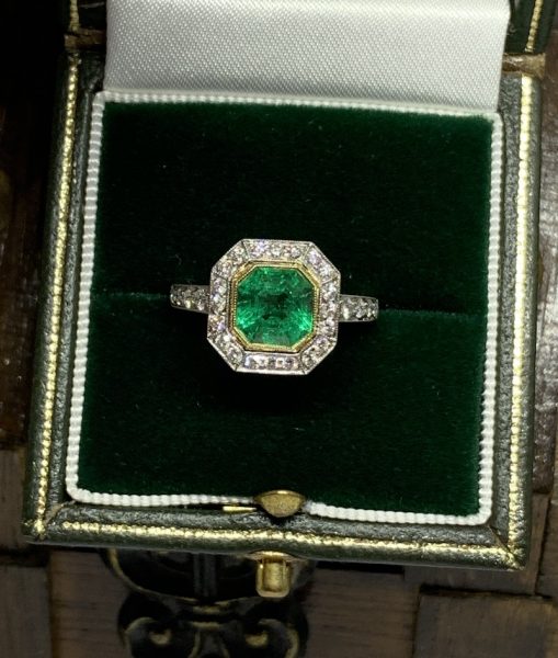 Deco style emerald and diamond engagement ring square target platinum