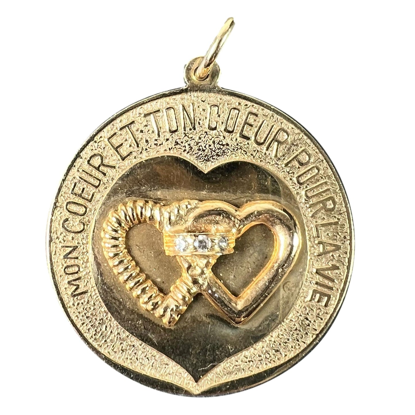 A round yellow gold love heart diamond pendant engraved MON COEUR ET TON COEUR POUR LA VIE