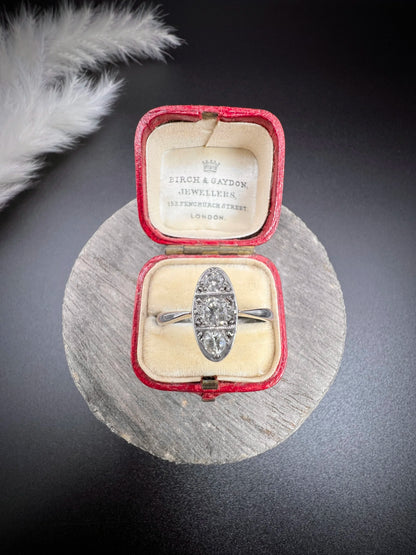 Antique Art Deco Platinum Three Stone Oval Shaped Diamond Ring, Circa 1920
